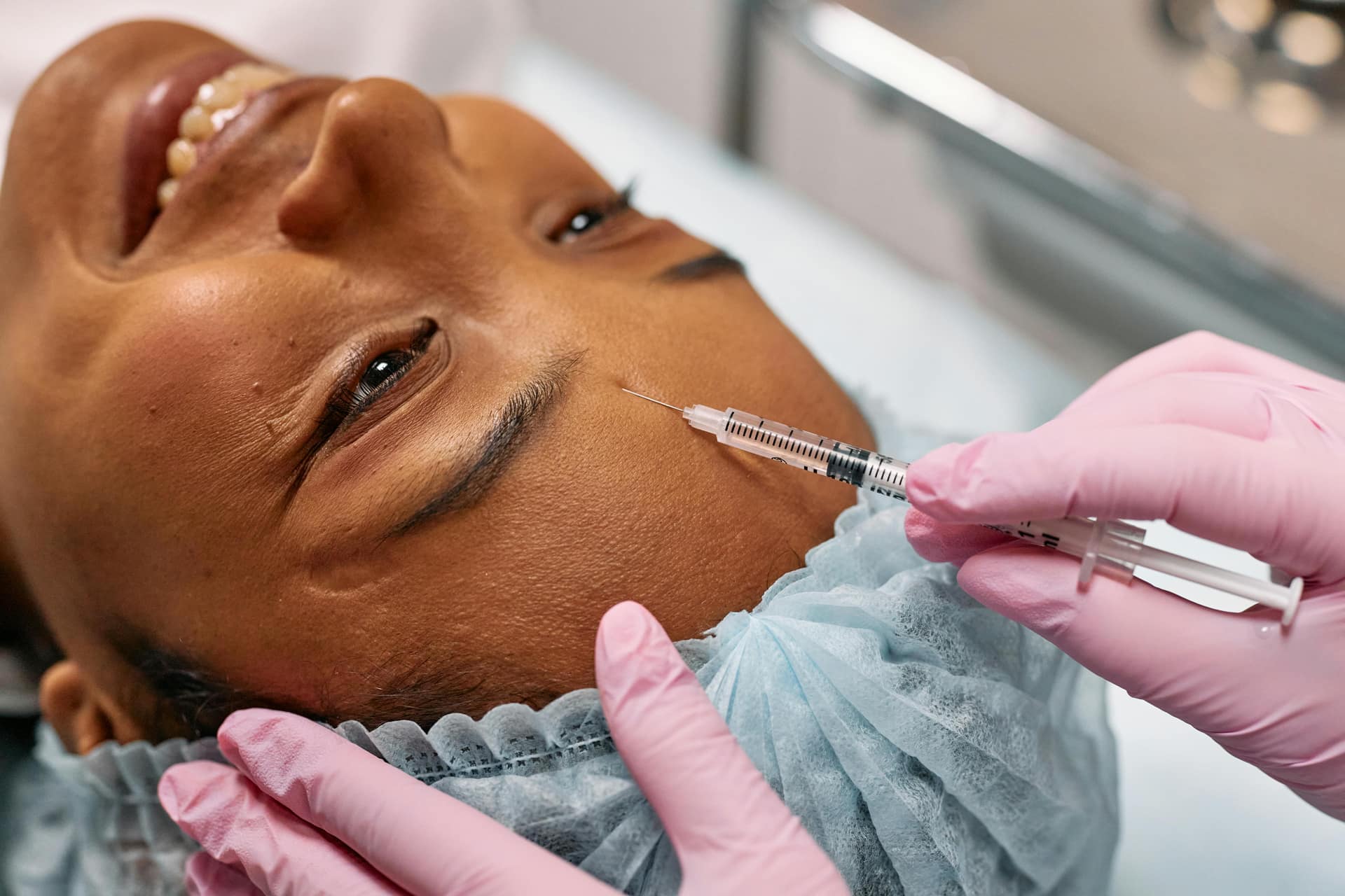 Medspa treatment — hands at work, Houston